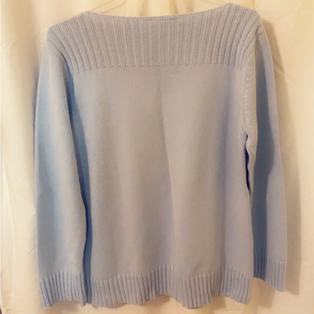 Claiborne sweater in a baby blue color.